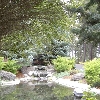 Stoneridge Townhomes, Sunriver, Or. one of three large water features, shrub beds, auto irrigation system and landscape lighting.