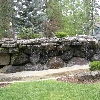 Stoneridge Townhomes, Sunriver, Or. one of three large water features, shrub beds, auto irrigation system and landscape lighting.