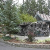 Stoneridge Townhomes, Sunriver, Or. one of three large water features, shrub beds, auto irrigation system and landscape lighting.